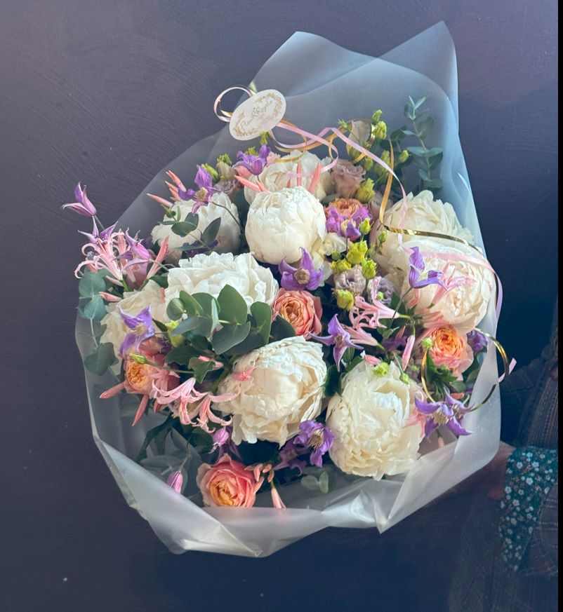 Romantic pastel flower bouquet with peonies and roses