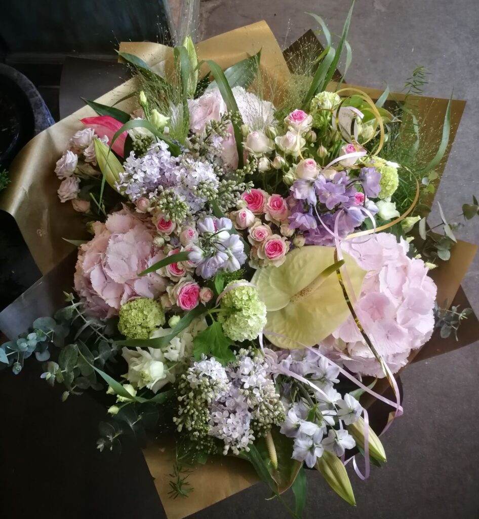 Pastel flower bouquet with pink hortensias and roses
