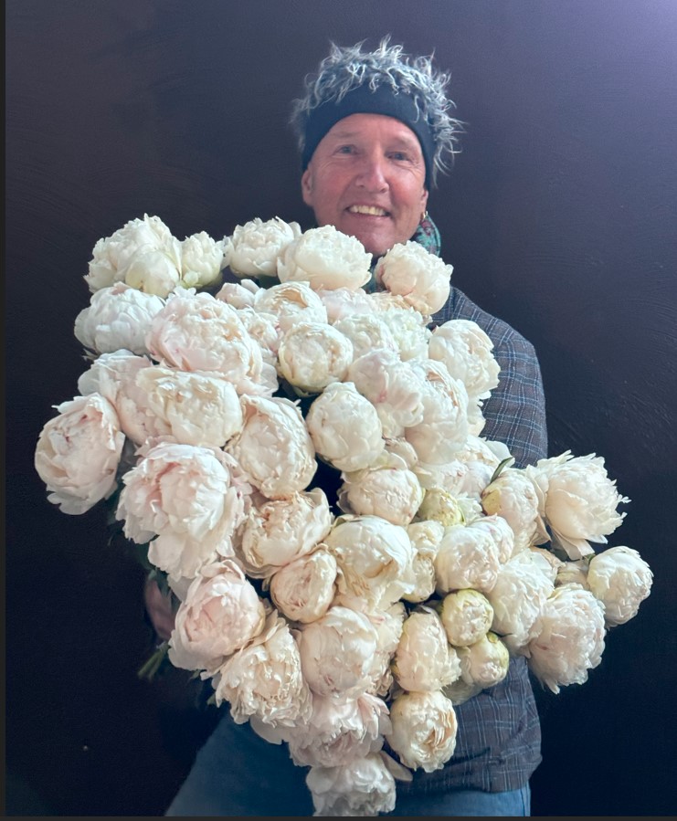 Romantic flower bouquet with huge white peonies