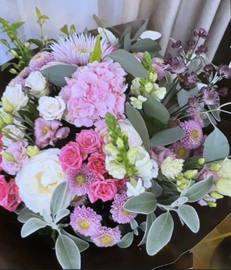 Pink, white and silver wedding bouquet with garden flowers